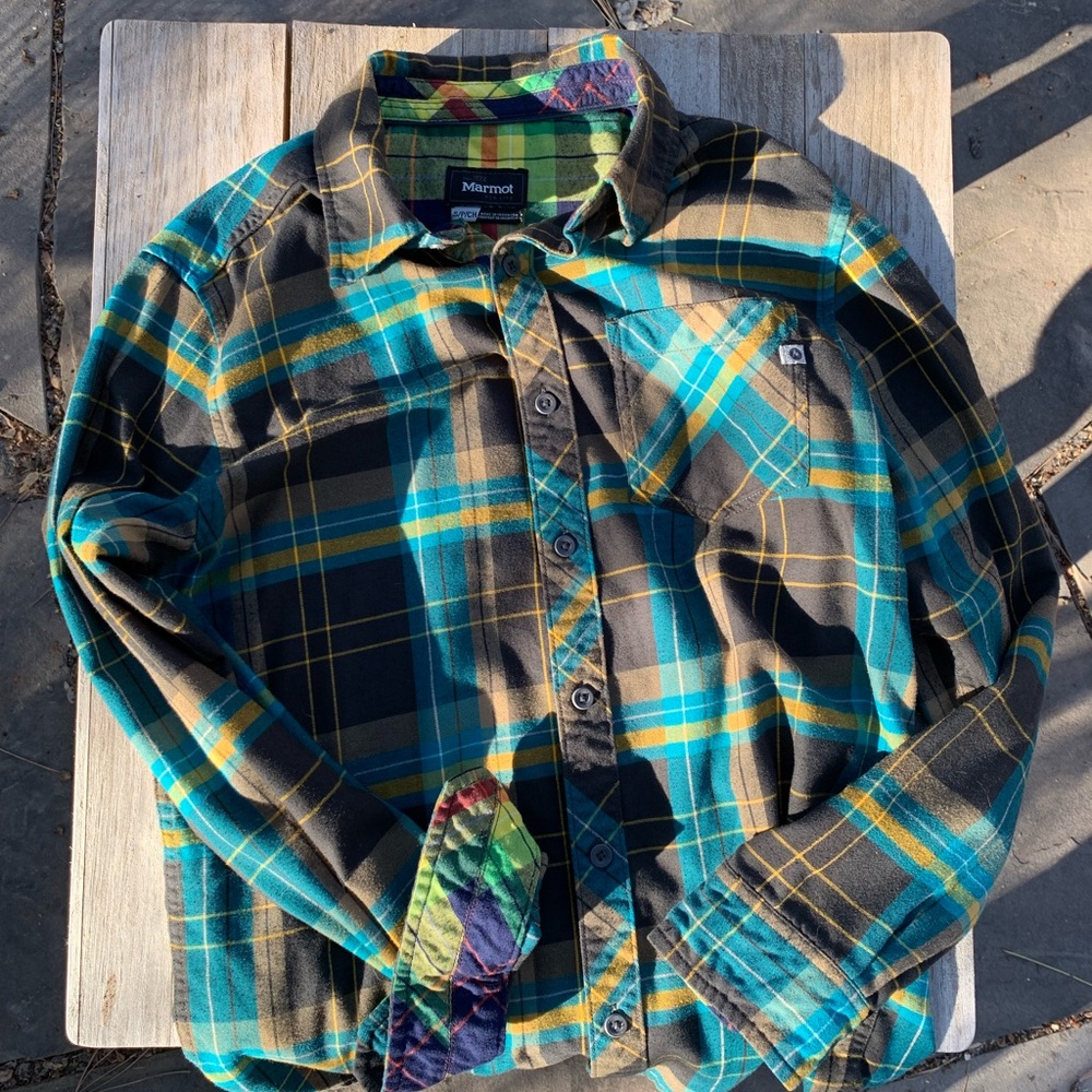 Marmot. Flannel. Tuck in or leave out.